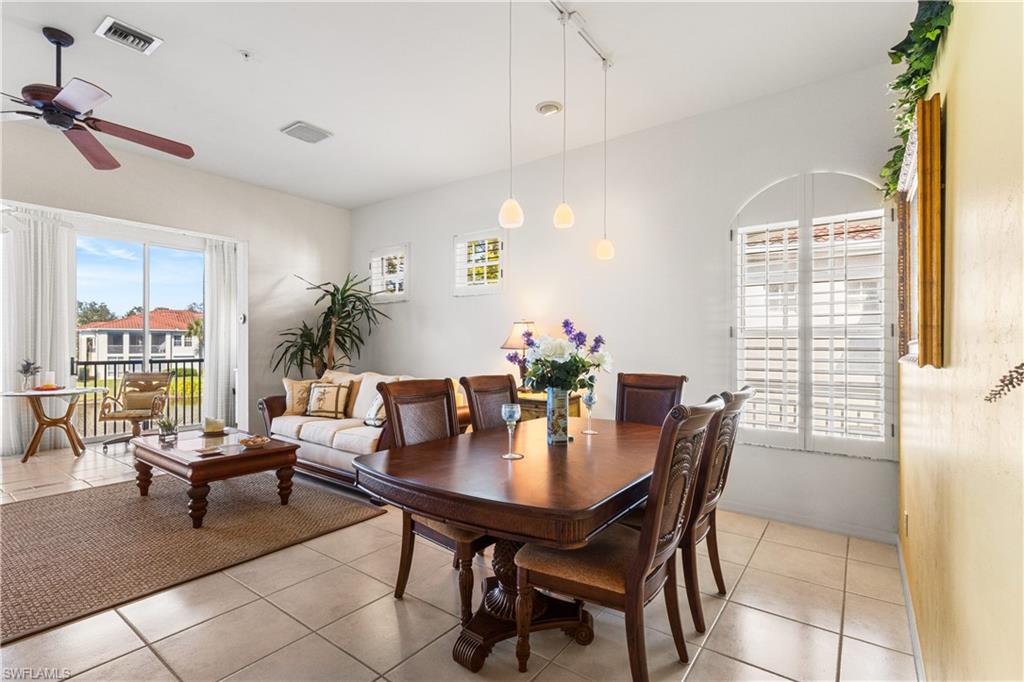 Dining in the great room with lake views.