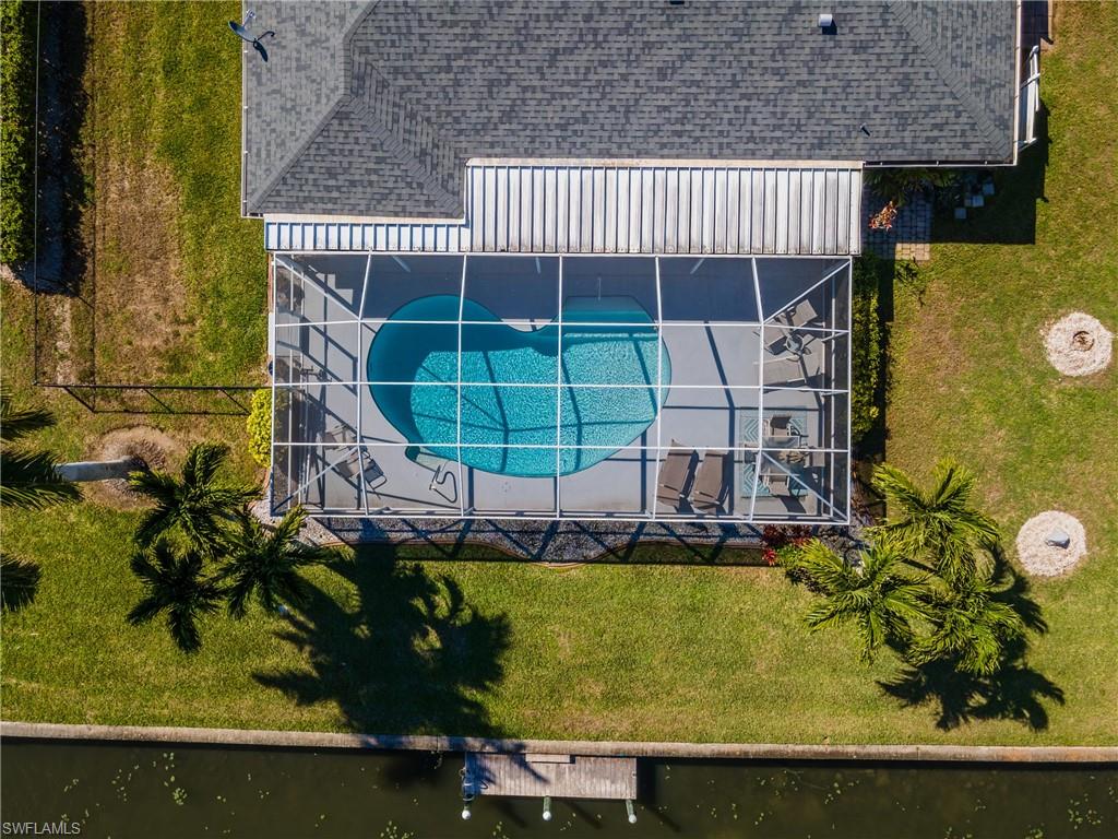 View from above of property with a pool area