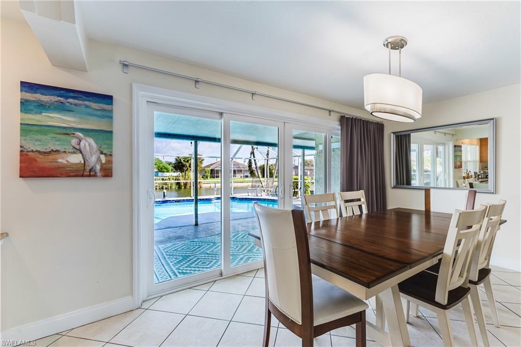 Dining room featuring light tile patterned floors