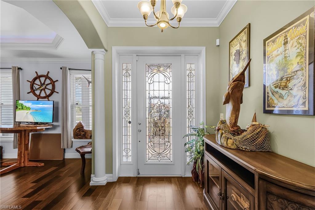 1,993 sq ft, 2 bedroom plus den, 2 bath, wood flooring, crown molding, 8's interior doors, granite throughout
