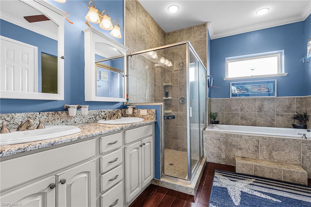 large primary suite, walk-in closet, walk-in shower, soaking tub, linen closet