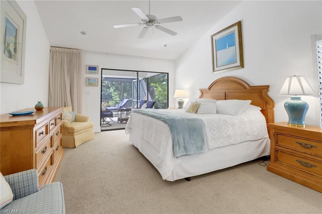 Spacious Primary Bedroom Suite, features, high ceilings, recessed lighting, sliding glass door opening on to covered screen lania, oversized walk in closet