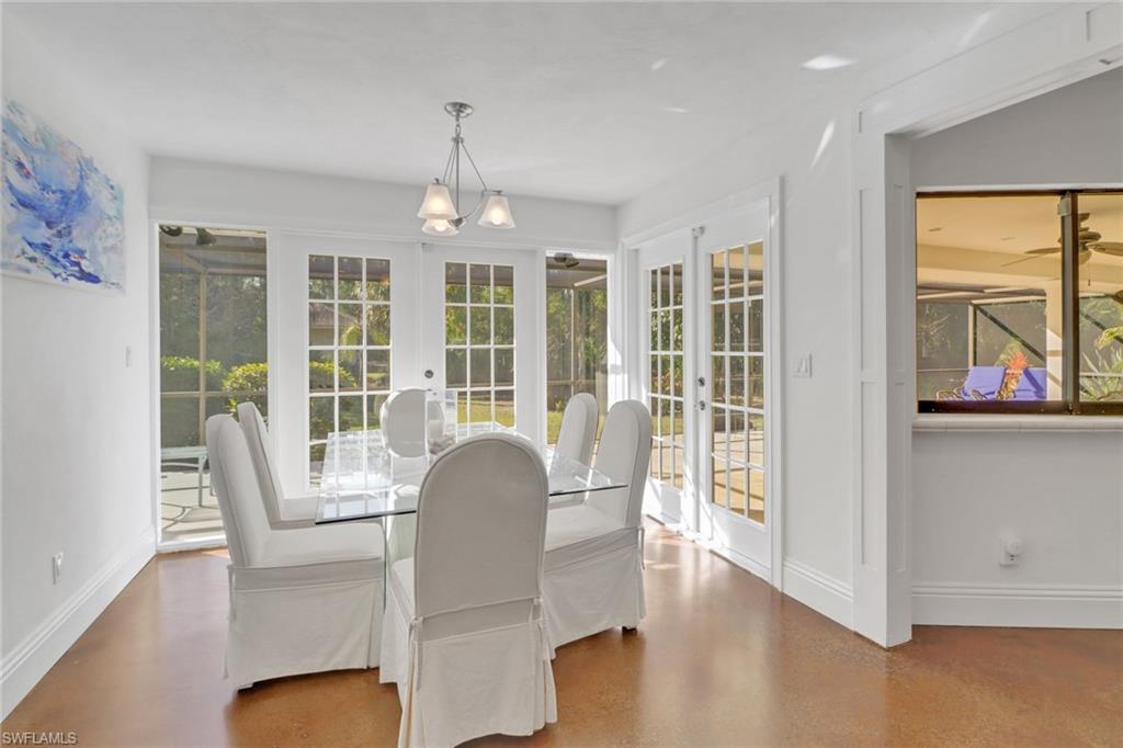 Dining Room, with French Doors that open to wrap around covered lanai