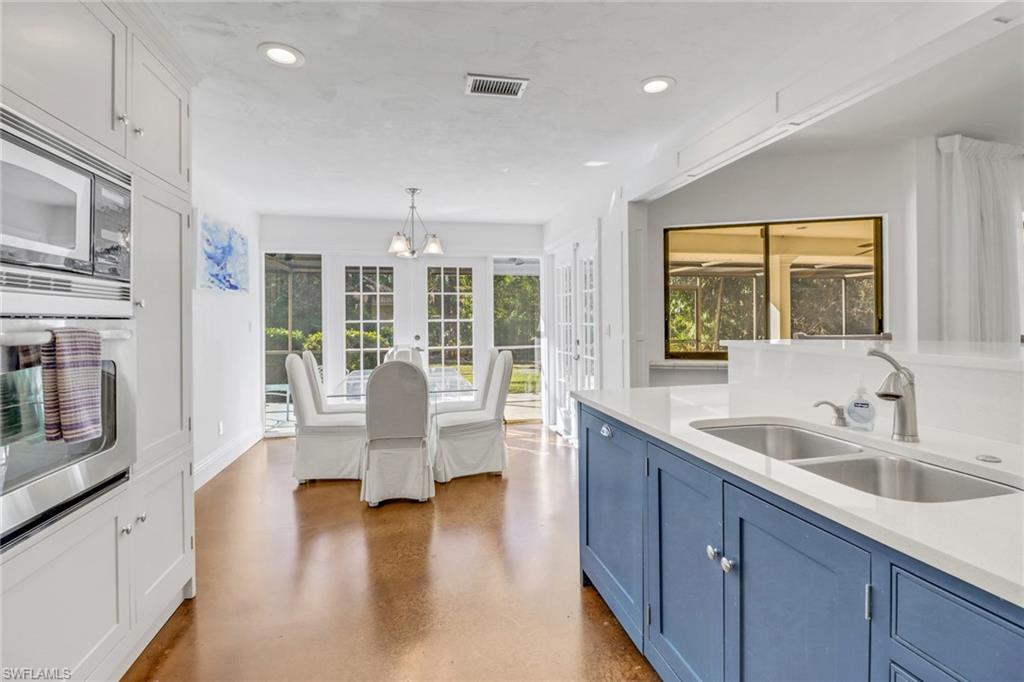 Kitchen looking into Dining Room Area, and partial view of oversized kitchen island