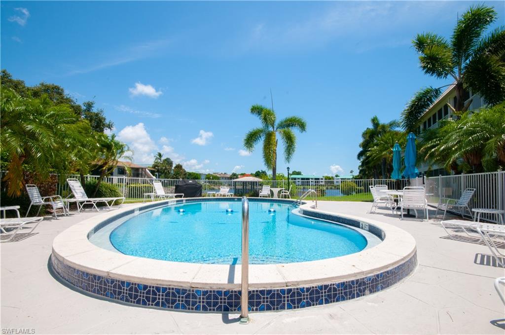 Community pool with a patio area