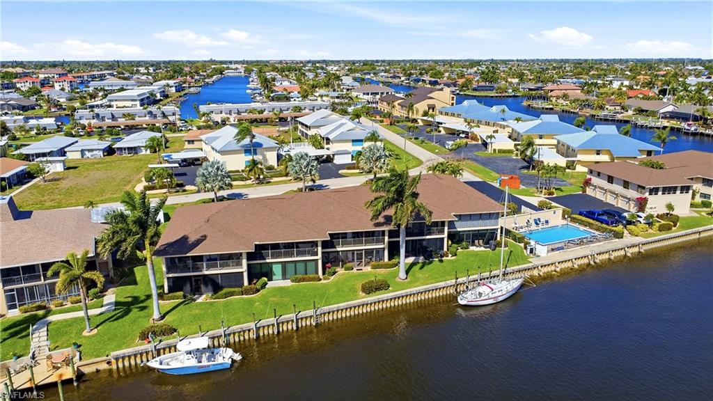 Aerial view of residential area with a large body of water