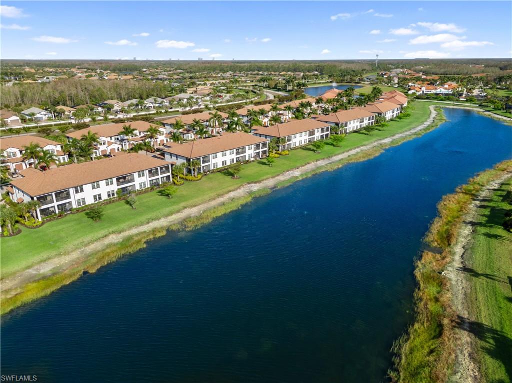 Aerial view of residential area with a large body of water
