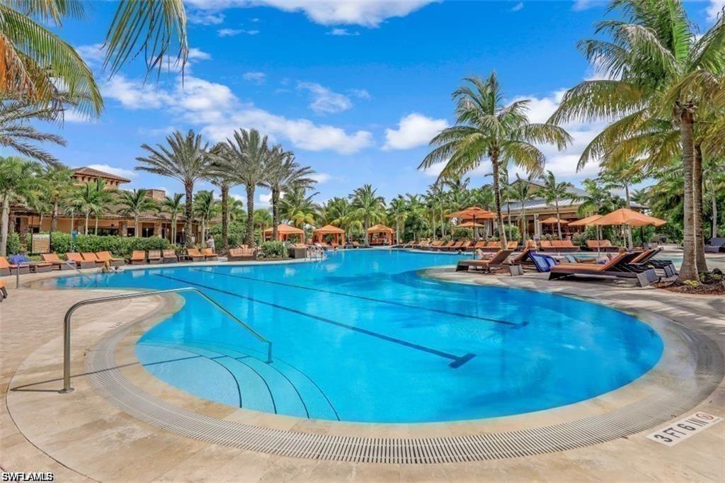 Community pool with a patio area