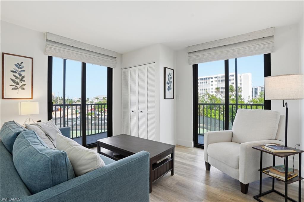 This is Bedroom #3 or a Flex Room.  Enhanced with two small balconies for additional light and space.-Virtually Edited Image