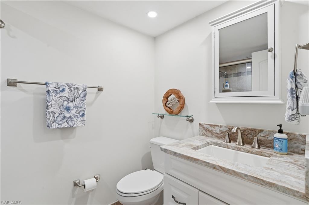 Guest Bathroom completely updated with walk-in shower and updated vanity and counters. -Virtually Edited