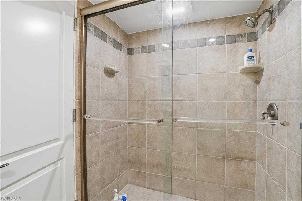 Guest bath featuring a stall shower