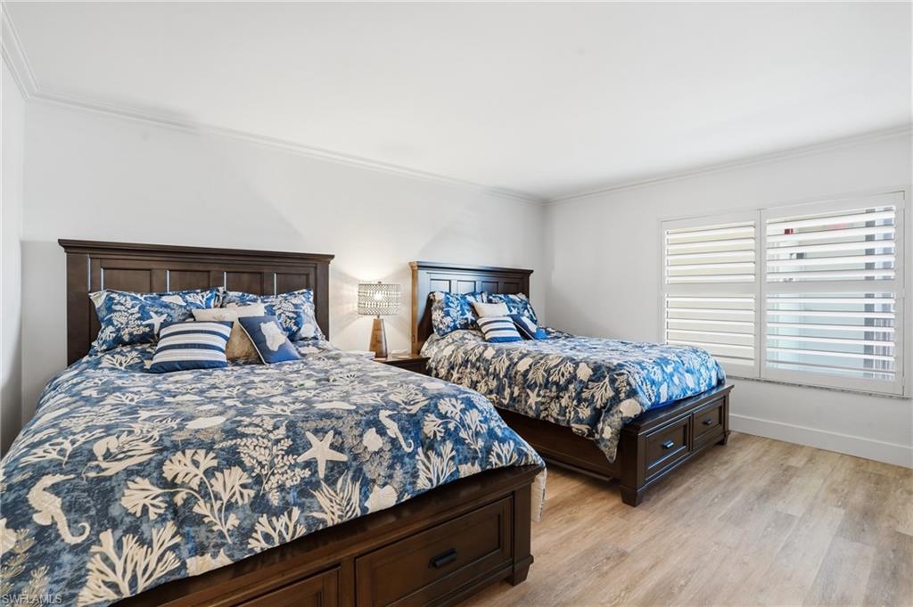 Guest Bedroom large enought for two queen size beds! - Virtually Edited Image