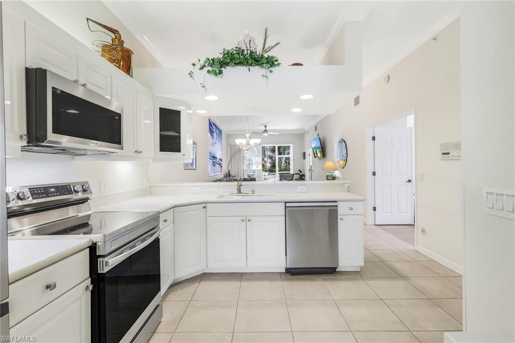 Kitchen with stainless steel appliances.