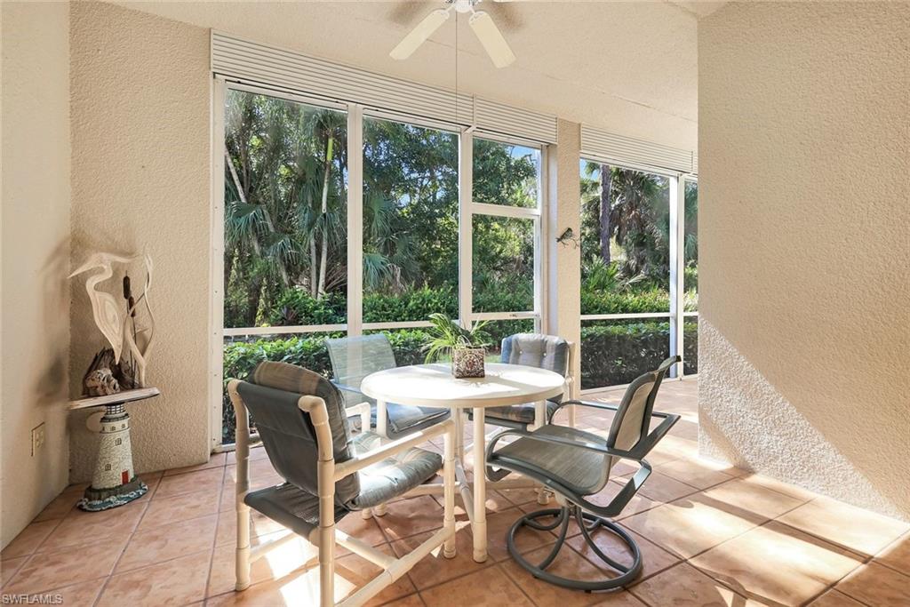 Southern facing rear Lanai with all day sun and manual storm shutters with screened door leading outside.