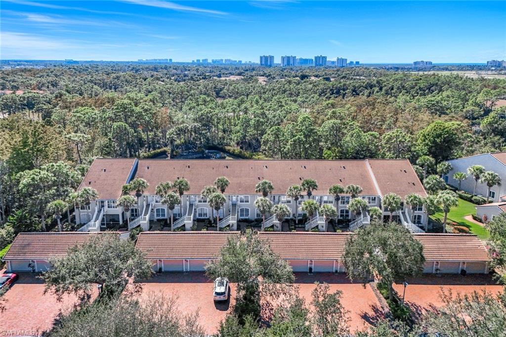 Aerial view of building with subject property on the far right corner, garage is the second one in from the right. This view is facing Southwest.