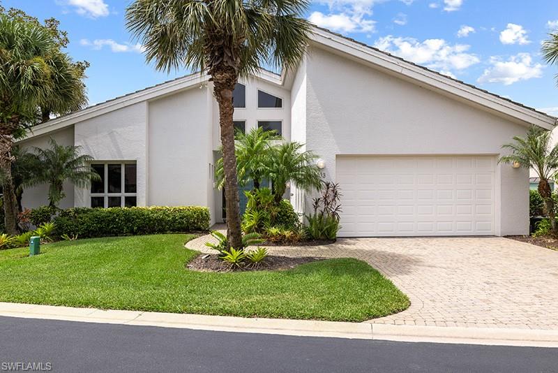 Front of home with drive