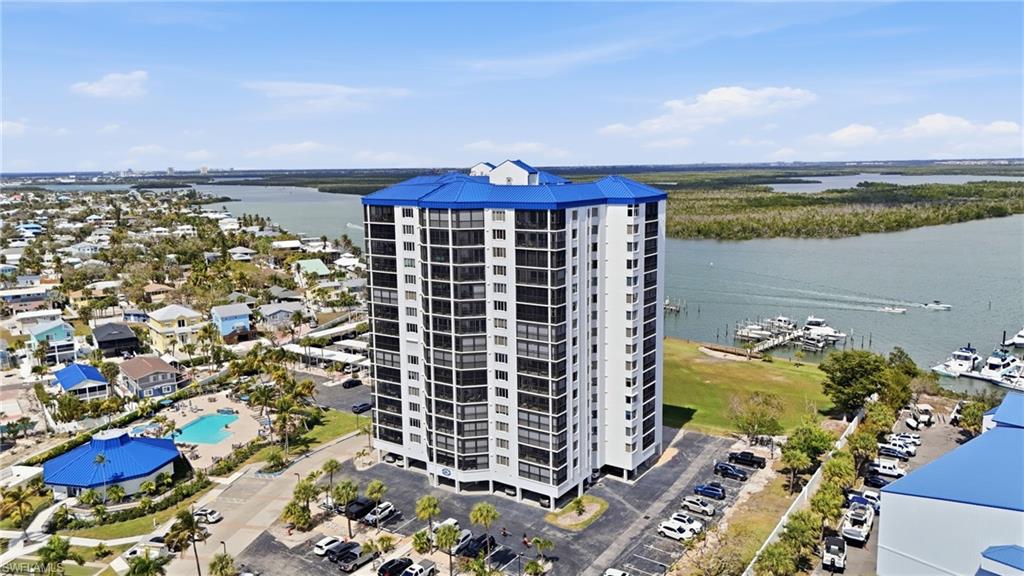 Bird's eye view of a nearby body of water and numerous boat docks - Virtually Edited Image