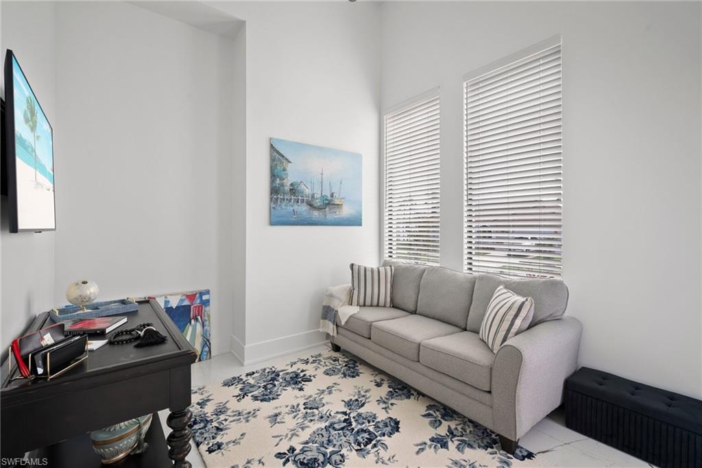 Living room featuring a wealth of natural light