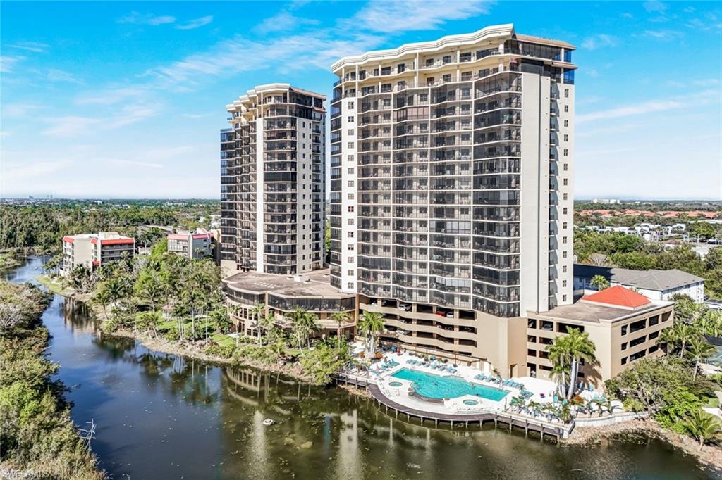 View of apartment building / complex with a water view