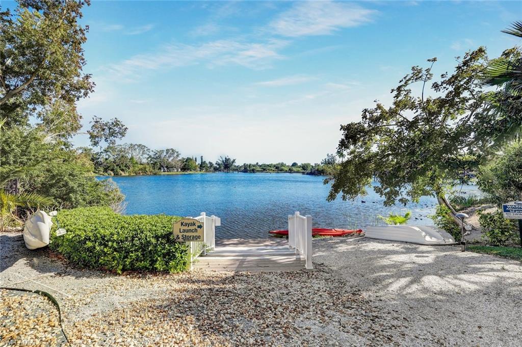 Water view featuring a boat ramp and a boat dock