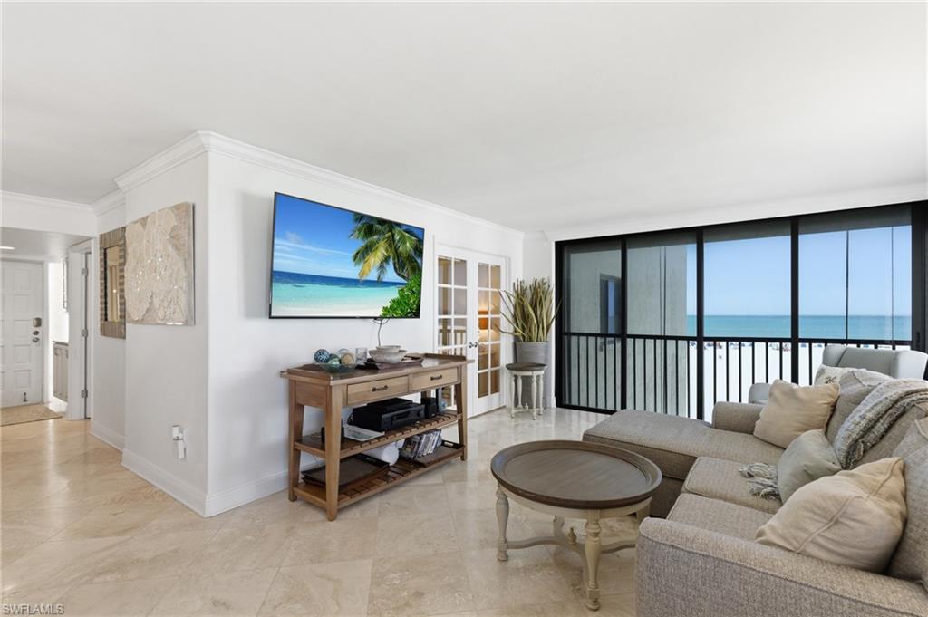 This Beachy Condo filled with natural light, ceramic tile throughout. Photo Digitally Enhanced