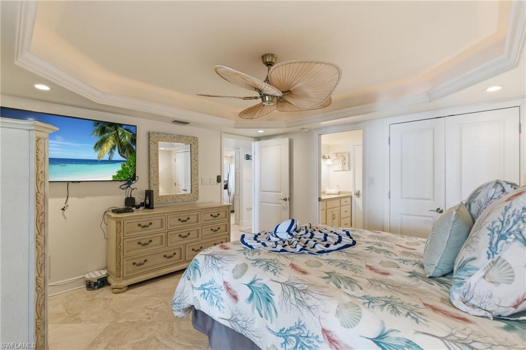 Owners suite with entrances to master bathroom and living area.  Photo may be digitally enhanced.