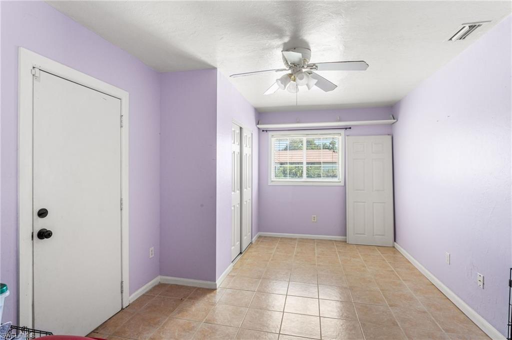 Carport converted to bedroom with separate entrance.  Perfect for a mudroom, guests or rental.