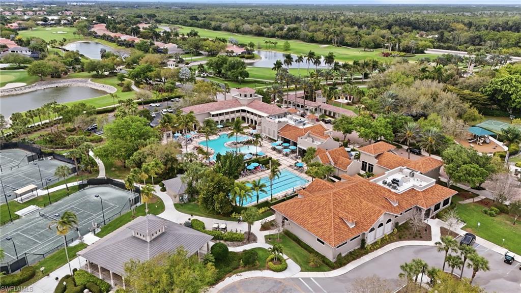 Drone / aerial view of a golf club and a large body of water