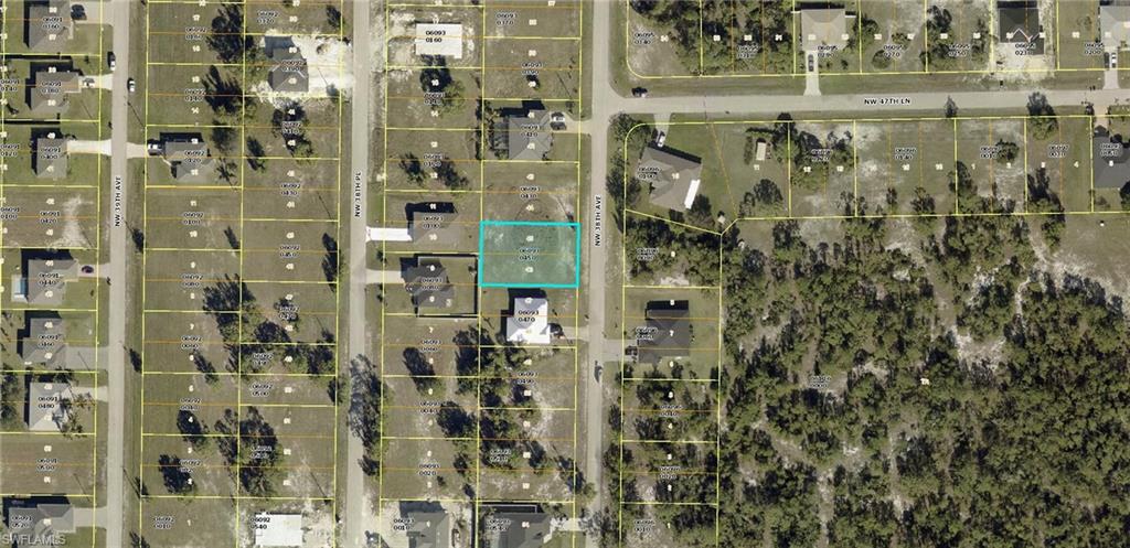 Aerial map of property and surrounding area with property parcel outlined