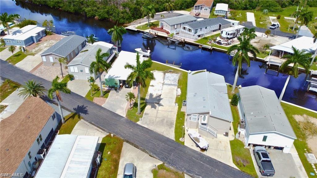 Birds Eye view of lot with Gulf access canal- virtually enhanced