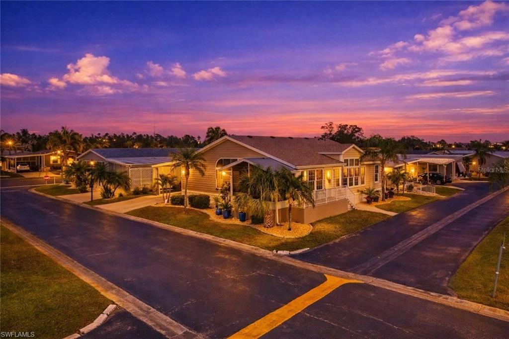 Single story home with a front lawn