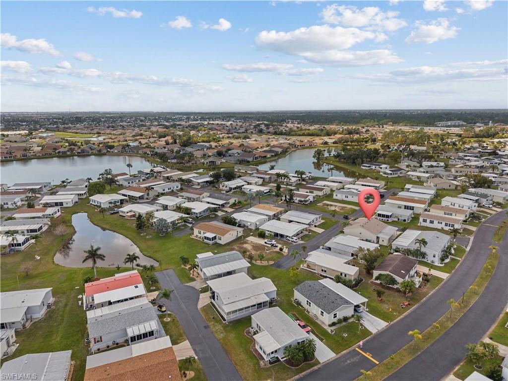 Aerial view of residential area with a large body of water