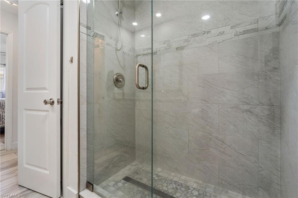 Full bath featuring a stall shower
