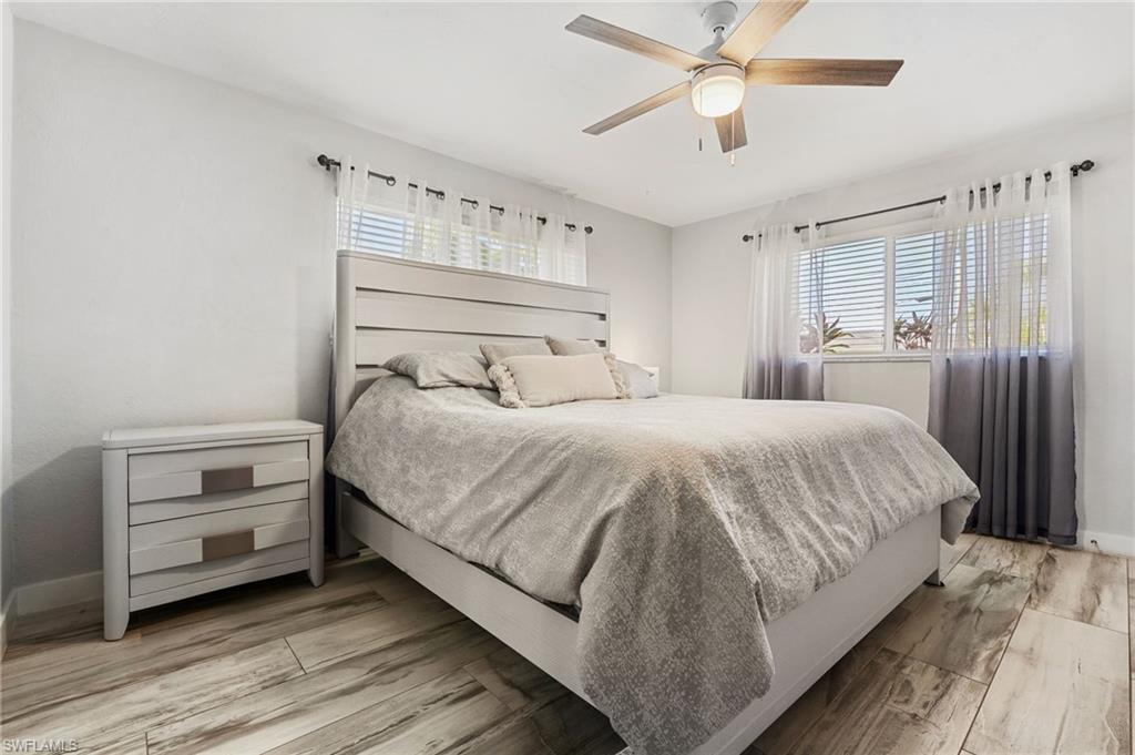 Bedroom featuring light wood-style floors and ceiling fan