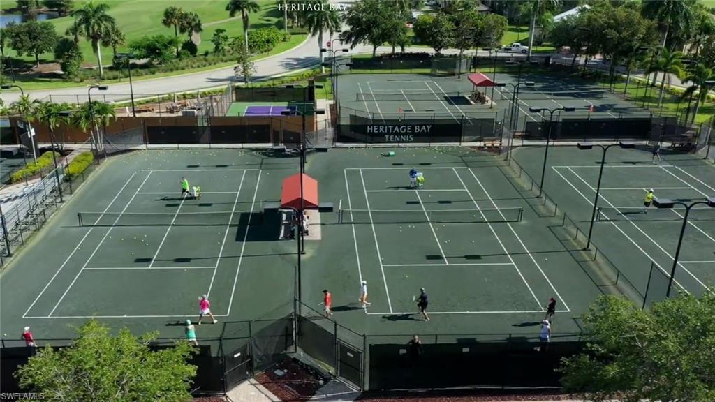 View of sport court featuring fence
