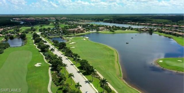Drone / aerial view of a golf club and a large body of water