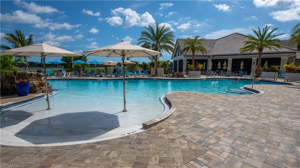 Community pool featuring a patio area