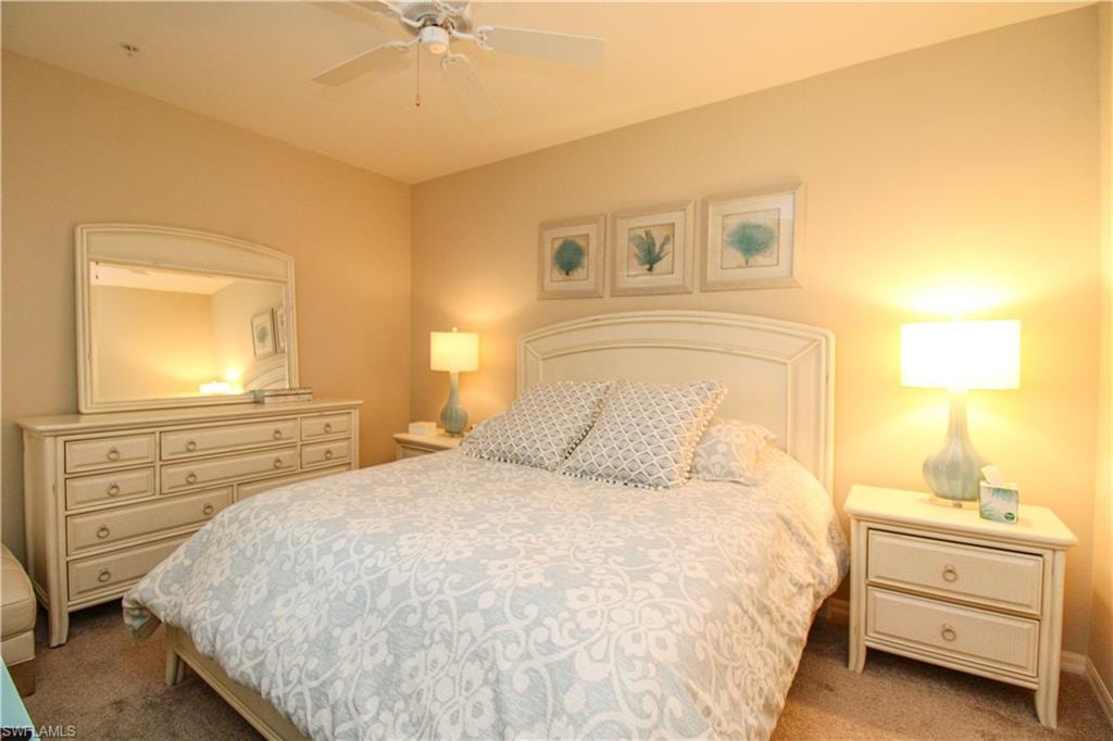 Bedroom with carpet flooring and ceiling fan