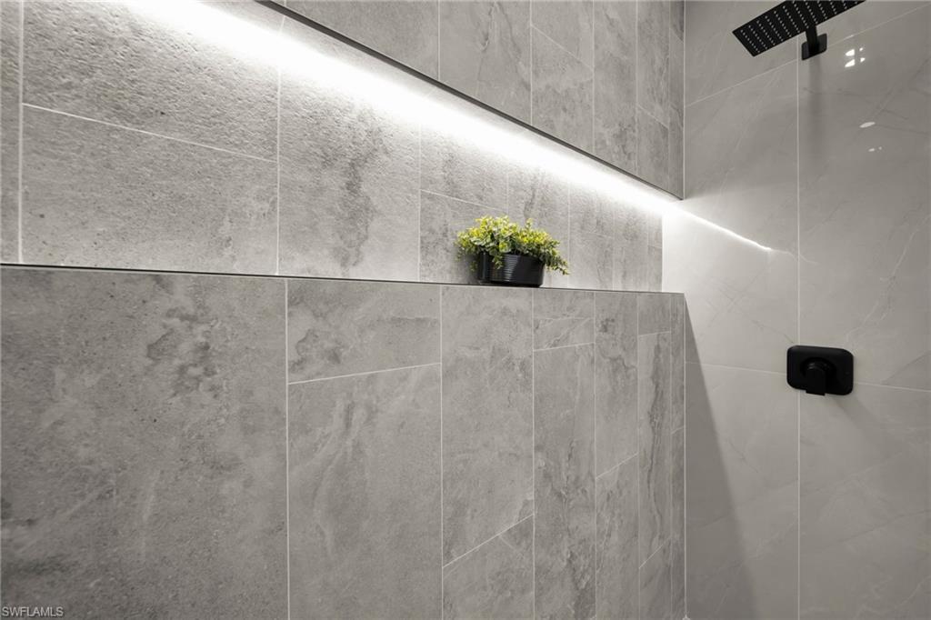 Bathroom view of tiled shower
