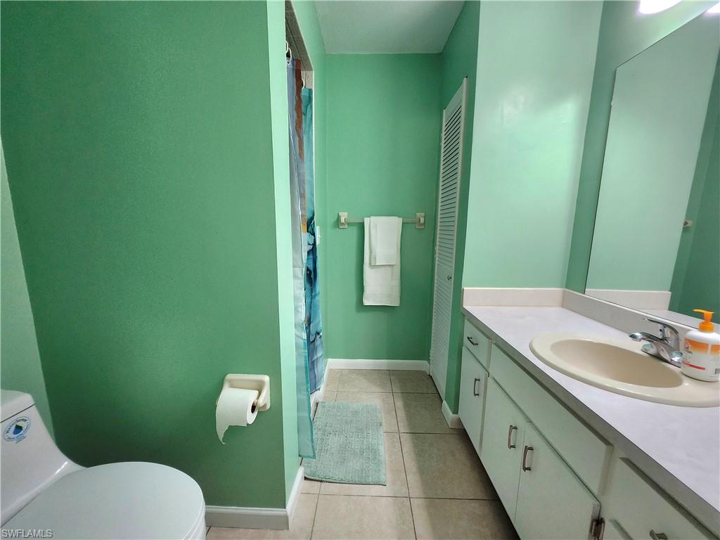 Main bathroom has a shower. Linen closet is across from the shower.
