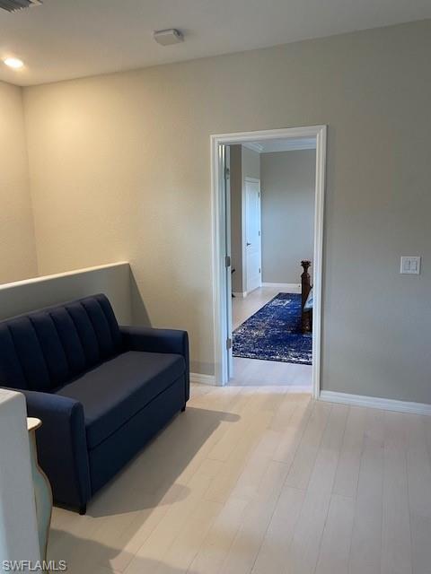 Living area featuring hardwood / wood-style flooring