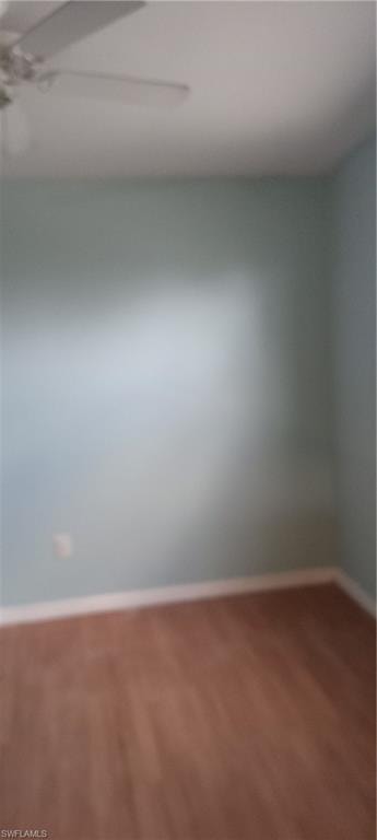 Unfurnished room with baseboards