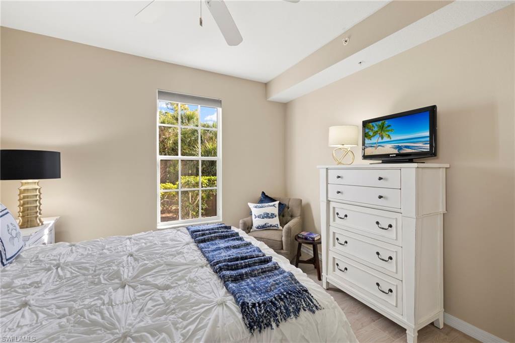 Bedroom with baseboards and a ceiling fan