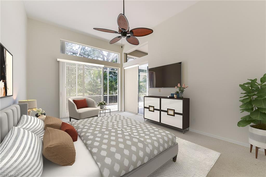 The primary bedroom is spacious and offers sliders for direct access to the large lanai.