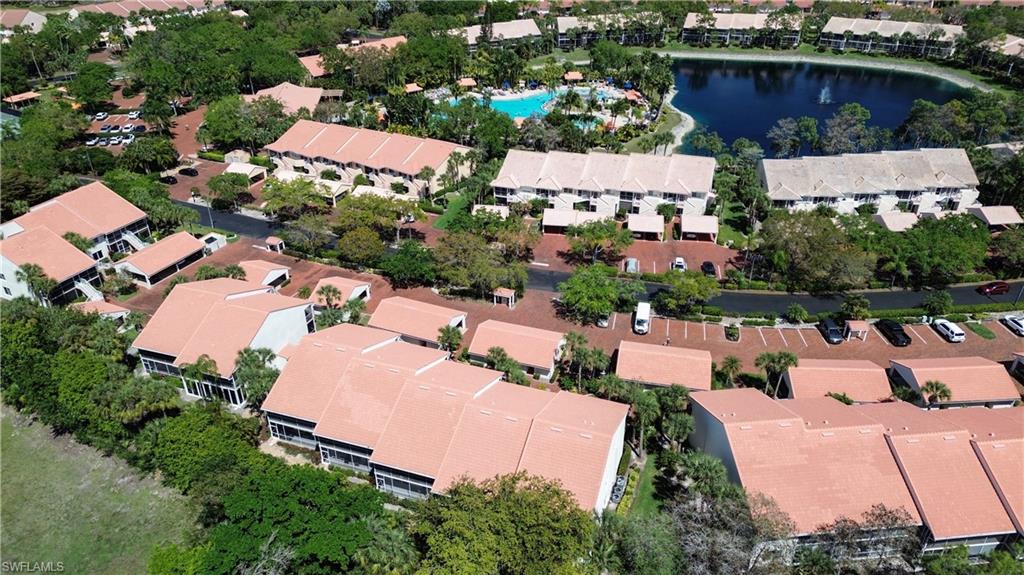 Aerial view of property's location featuring nearby suburban area