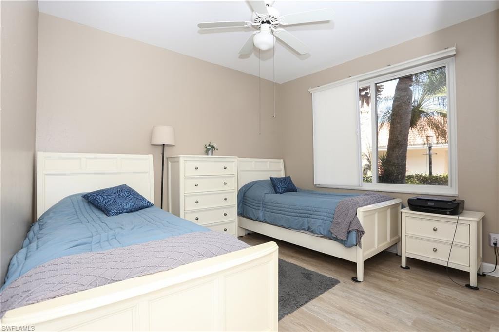 Bedroom featuring light wood-style floors and ceiling fan