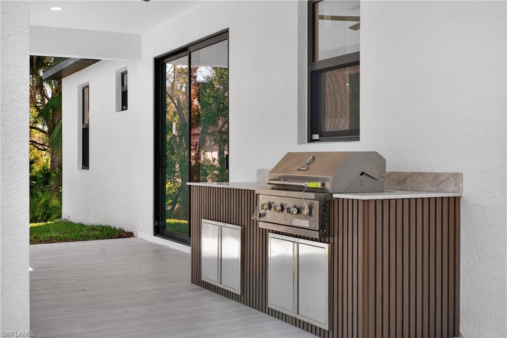 View of patio with exterior kitchen