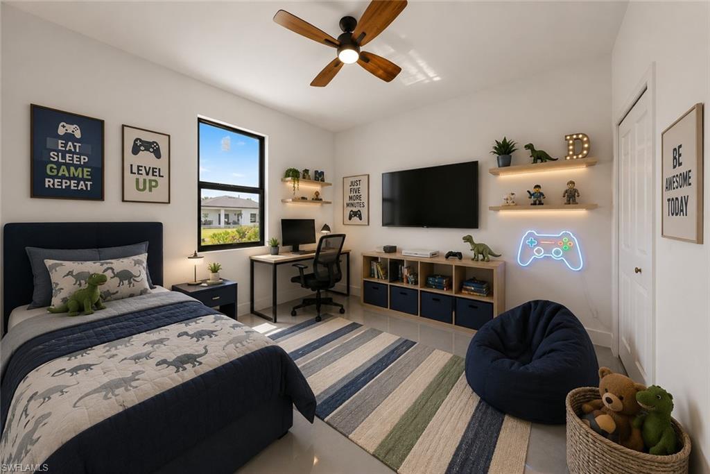 Bedroom featuring a large window, a wood-finish ceiling fan, built-in wall shelving with integrated lighting, a built-in media console, and a solid core door