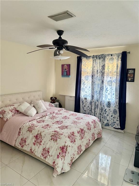 Bedroom with a ceiling fan