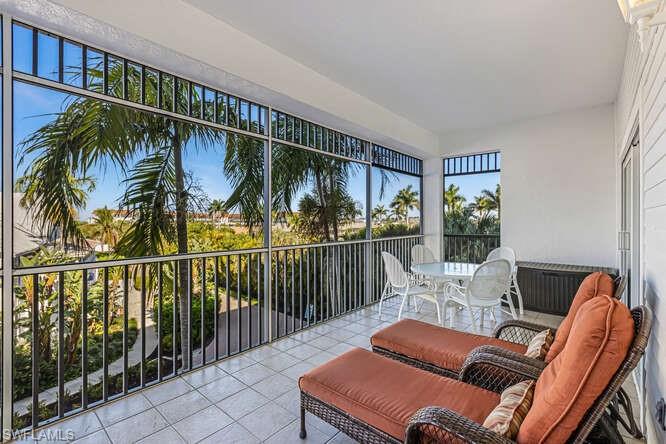 Sunroom / solarium with tile patterned flooring
